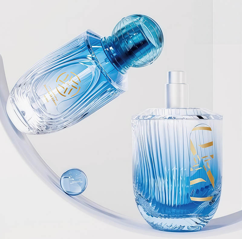 Luxurious transparent blue tinted glass perfume bottle with pump mechanism