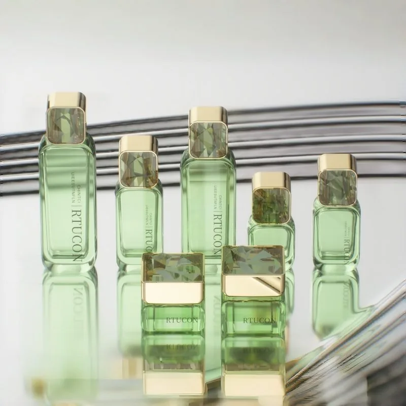 Mint Green Glass Skincare Bottle Set with Gold Cap
