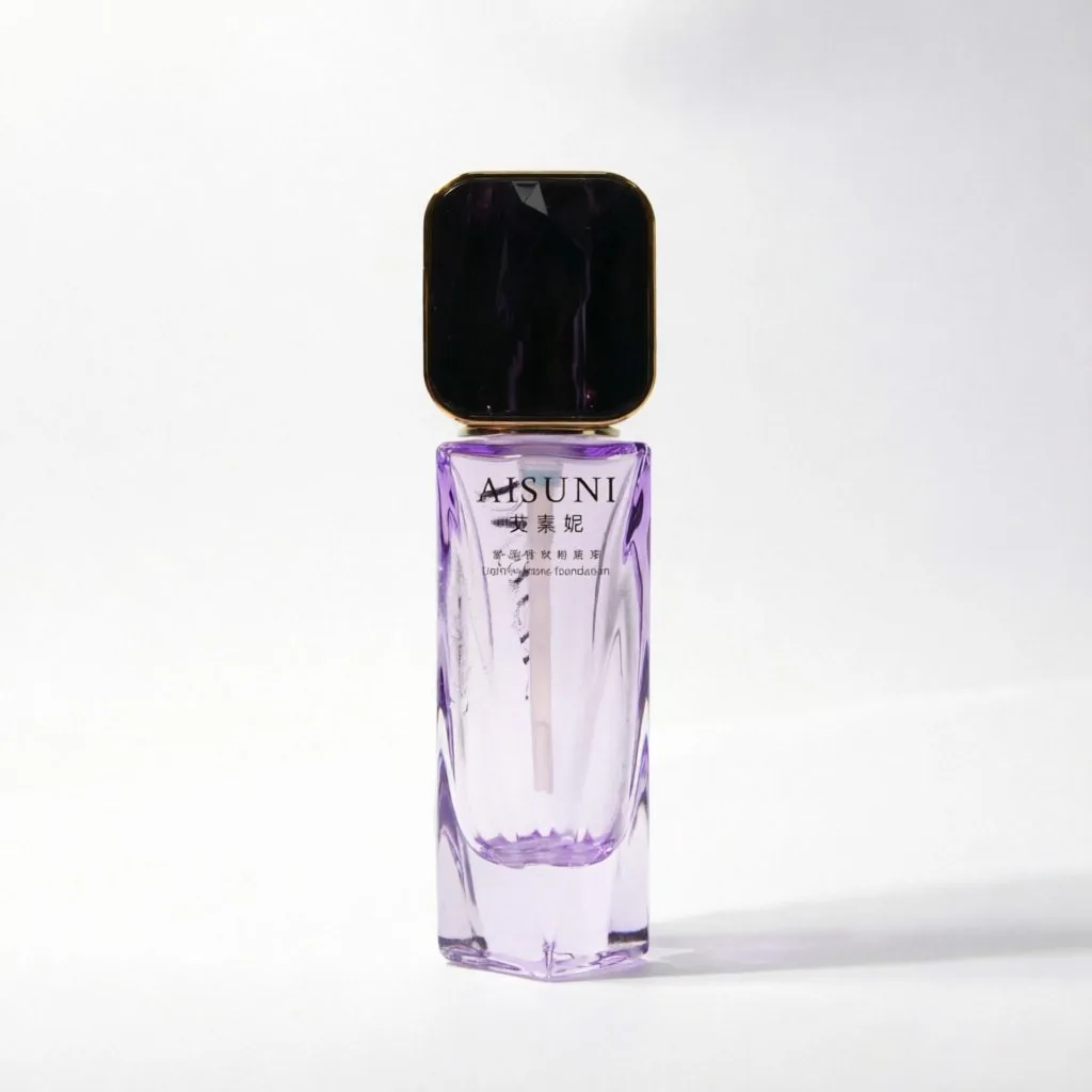 Geometric Cut Glass Foundation Bottle with Metallic Pump