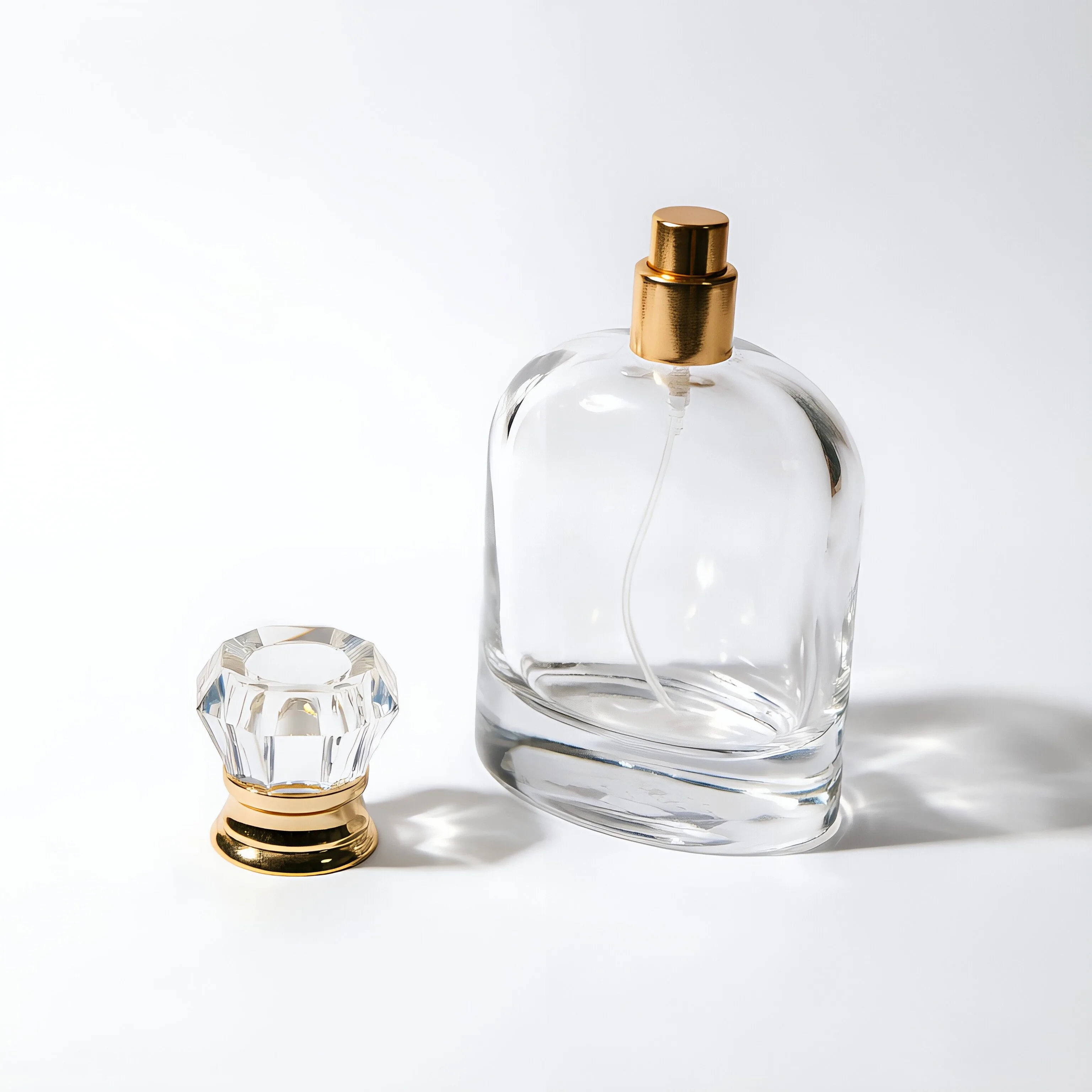 Oval Clear Glass Perfume Bottle with Gold Spray Pump 100ml